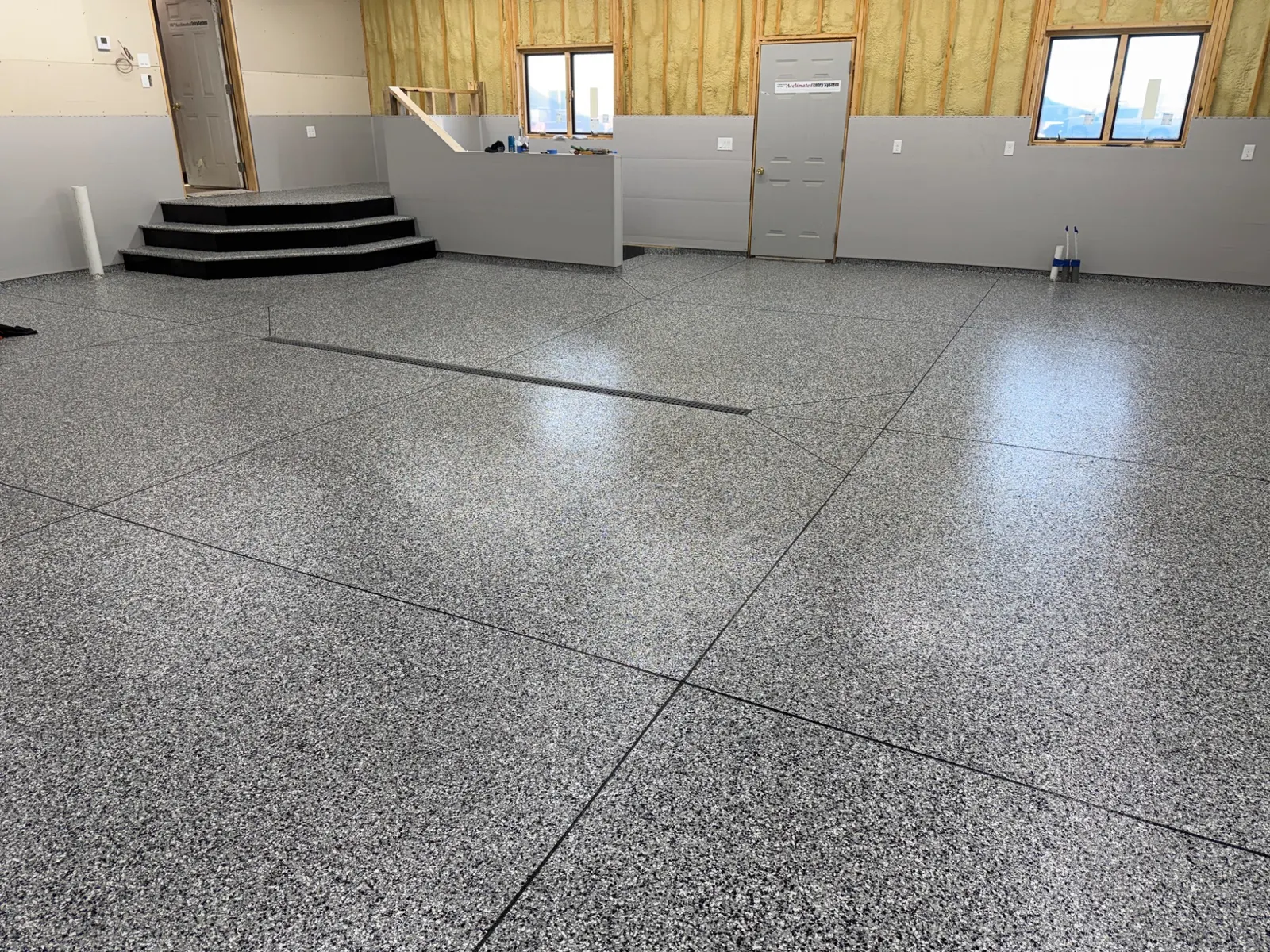 Large commercial resinous flooring system installed by E&M Coatings