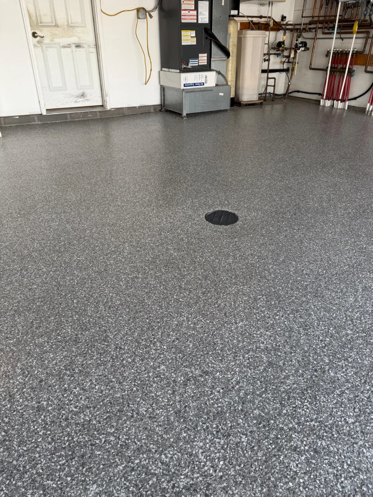 Garage floor with drain