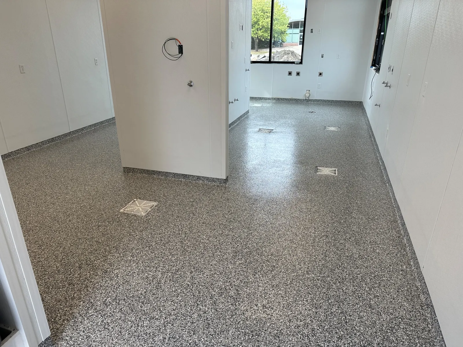 Commercial wet-area resinous flooring